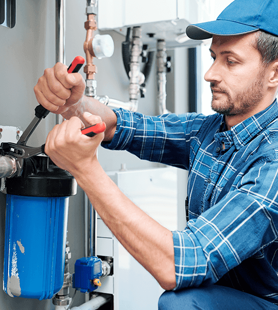 Gigwell technician servicing a water filtration system